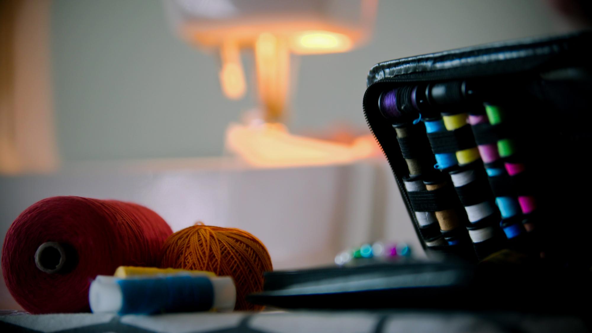 Studio workspace with threads and design monitor